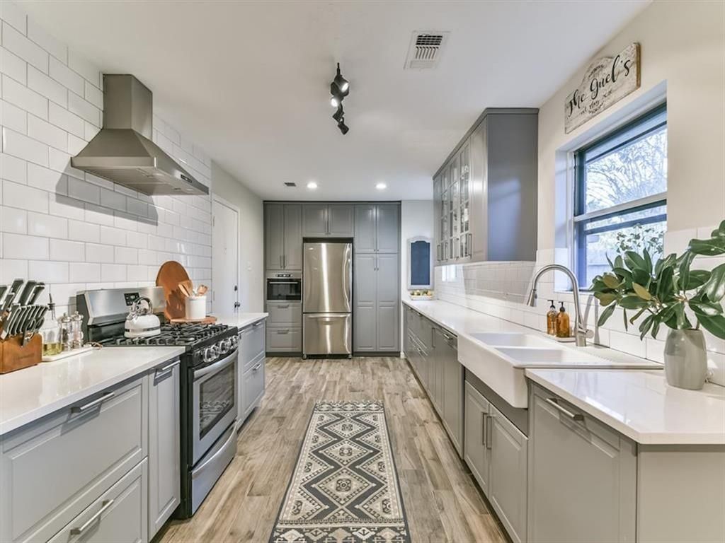 Interior, Kitchen, Recessed Lighting, Stainless Steel Appliances, Wood Texture Flooring