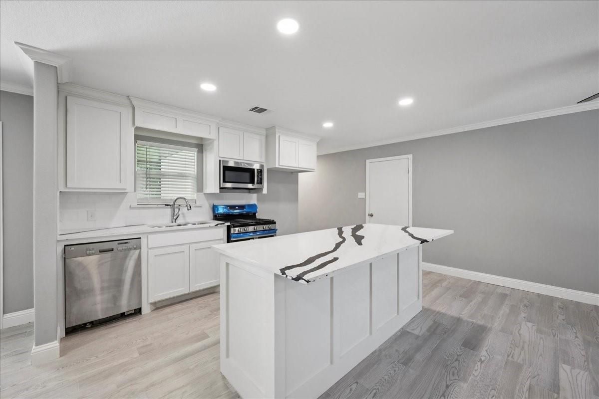 Interior, Kitchen, Recessed Lighting, Stainless Steel Appliances, Wood Texture Flooring