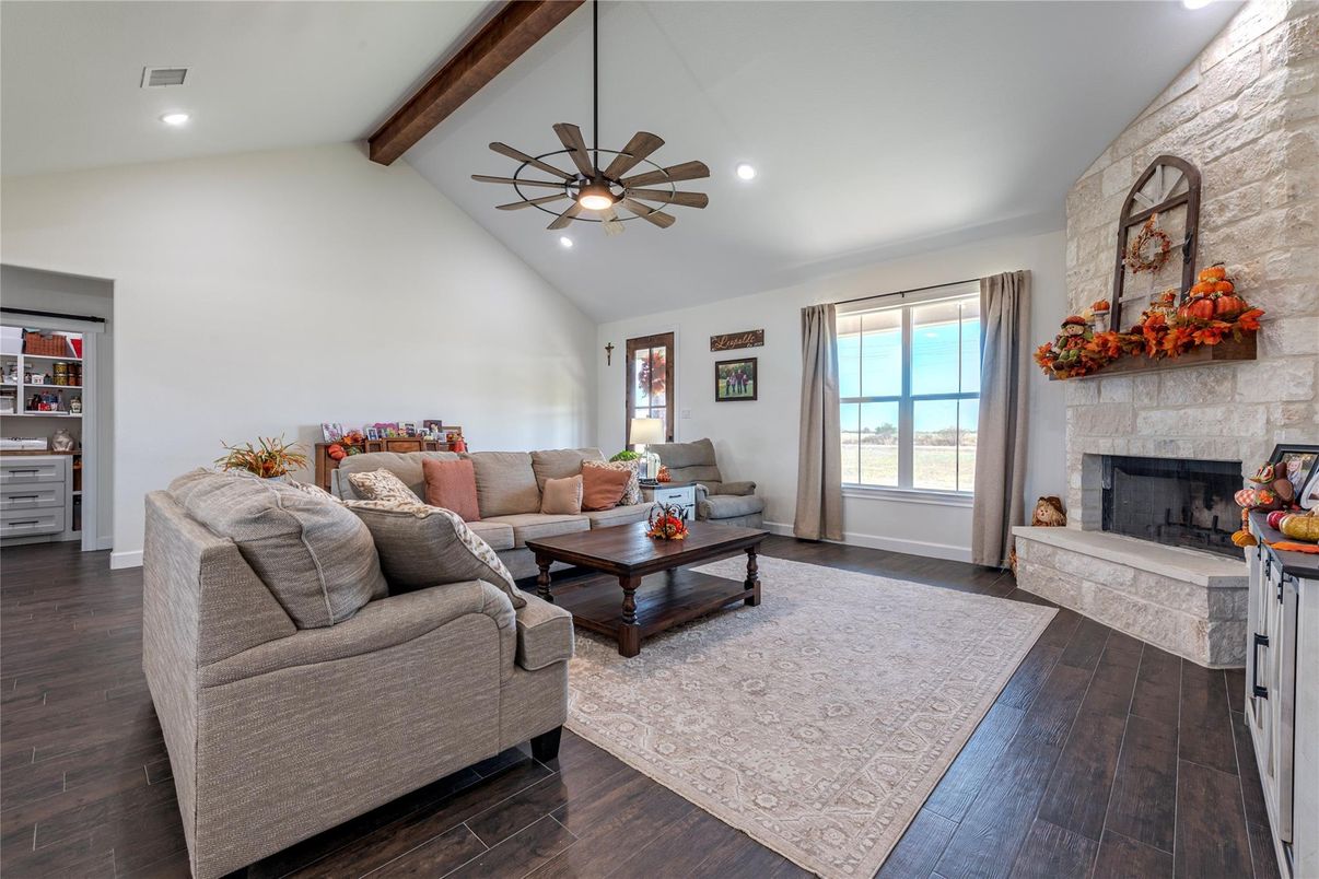 Fireplace, Interior, Living room, Recessed Lighting, Stone Walls, Wooden Beams, Wood Texture Flooring