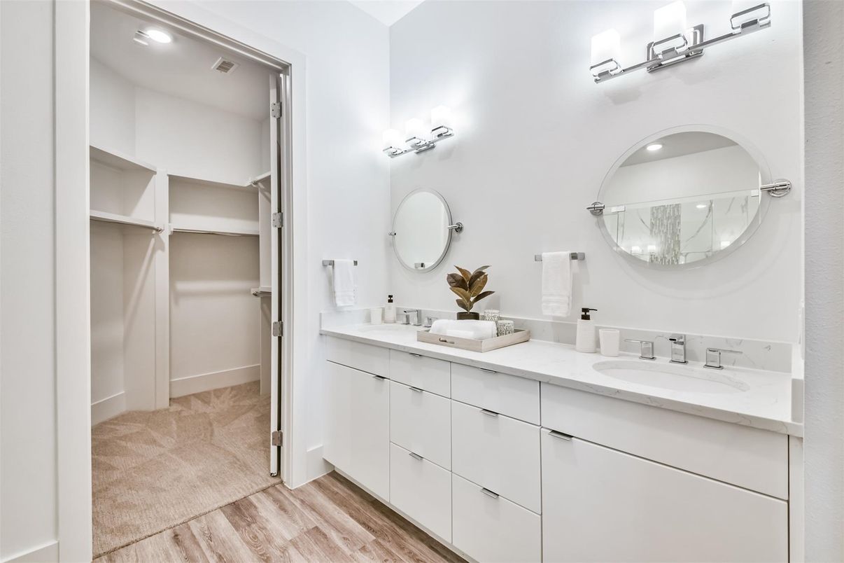 Bathroom, Dual Sink Vanities, Interior, Recessed Lighting, Walk-in Closets, Wood Texture Flooring