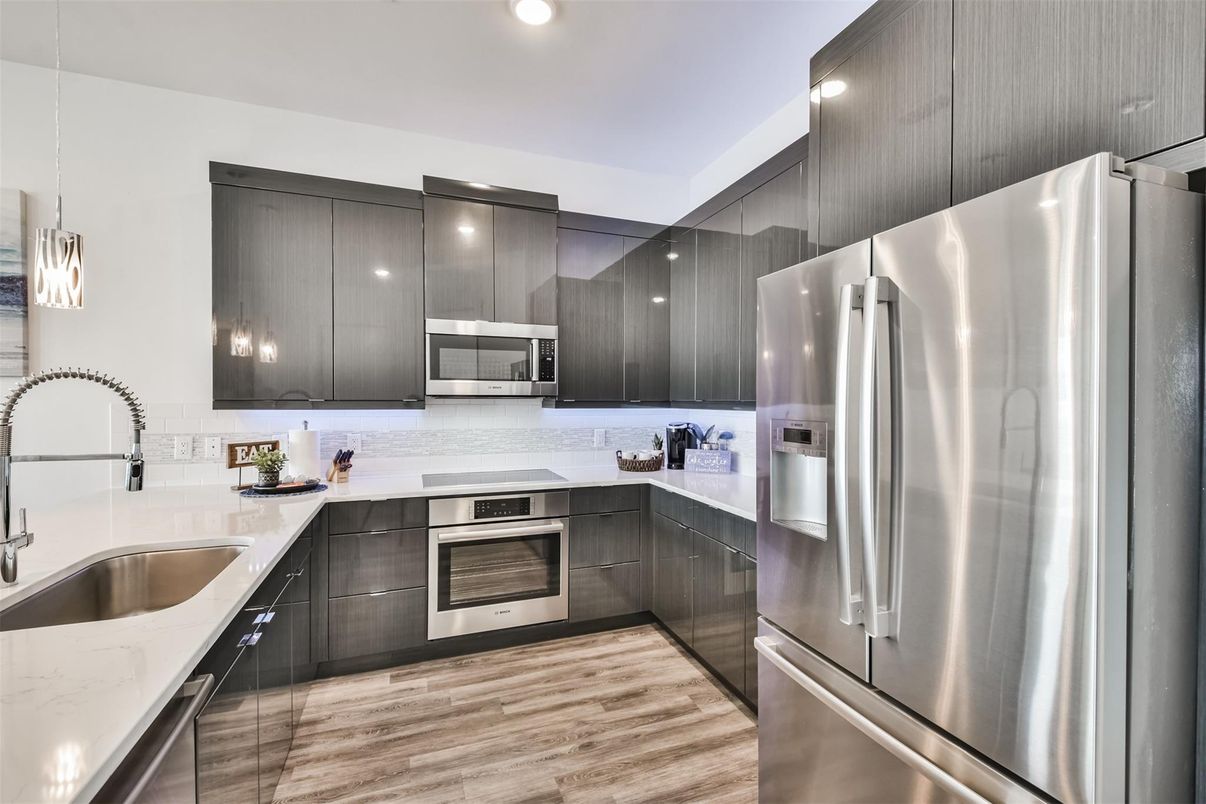 Interior, Kitchen, Pendant Lights, Recessed Lighting, Stainless Steel Appliances, Wood Texture Flooring