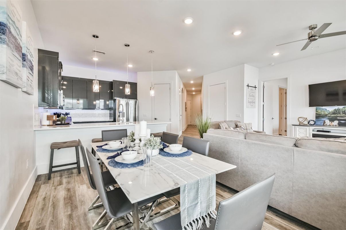 Dining room, Interior, Kitchen, Living room, Pendant Lights, Recessed Lighting, Stainless Steel Appliances, Wood Texture Flooring