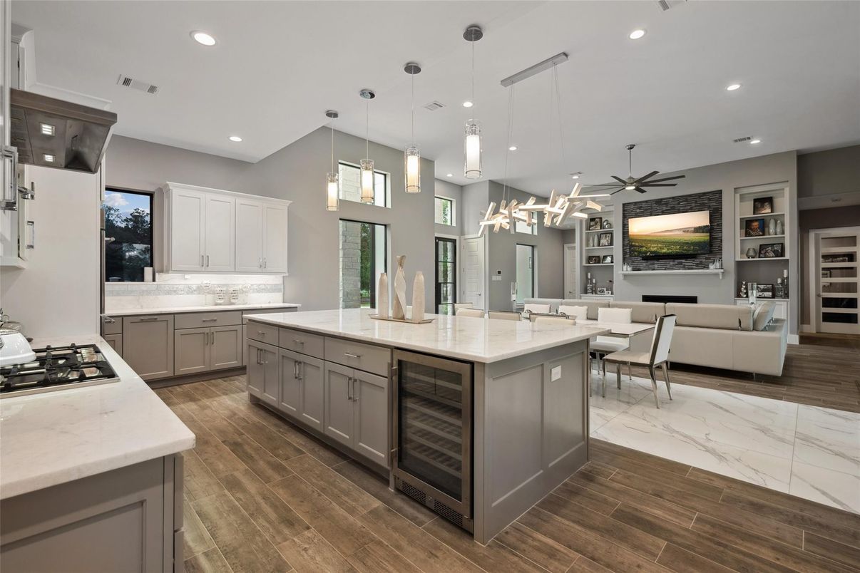 Dining room, Interior, Kitchen, Living room, Marble, Pendant Lights, Recessed Lighting, Stainless Steel Appliances, Wood Texture Flooring