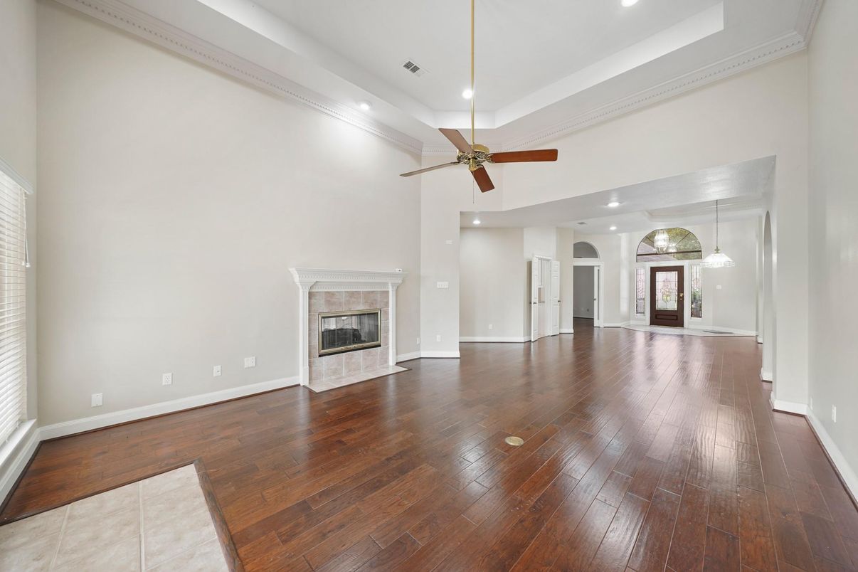 Empty room, Fireplace, Interior, Pendant Lights, Recessed Lighting, Wood Texture Flooring