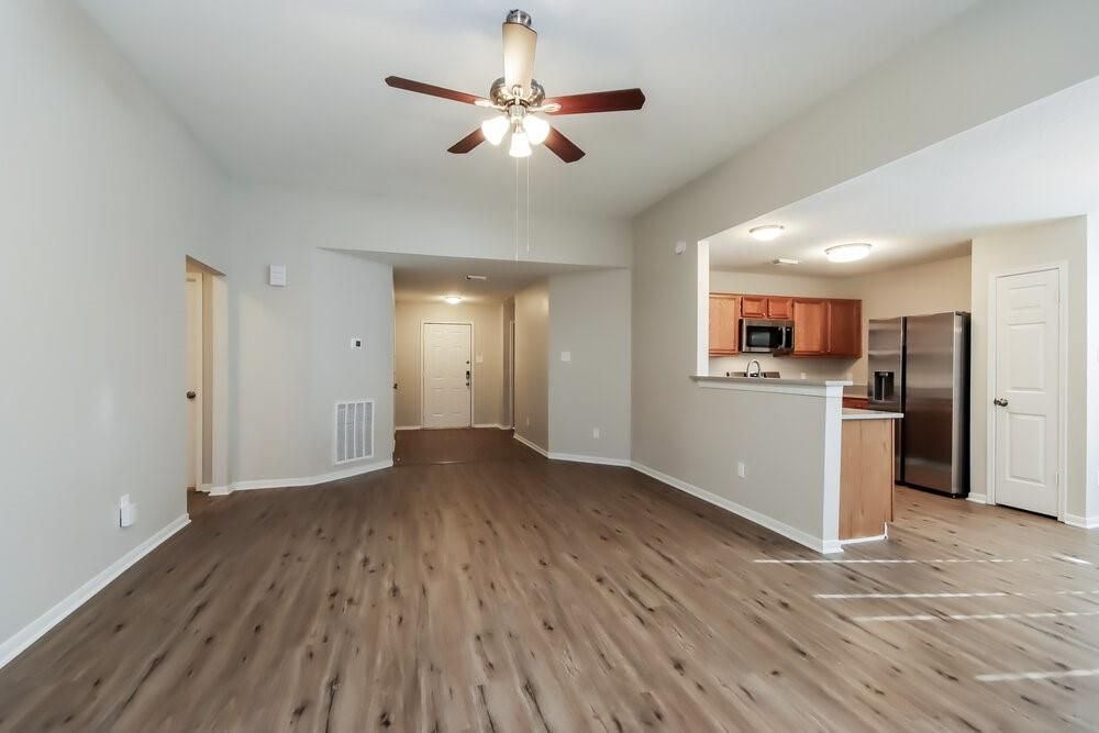 Empty room, Interior, Kitchen, Stainless Steel Appliances, Wood Texture Flooring