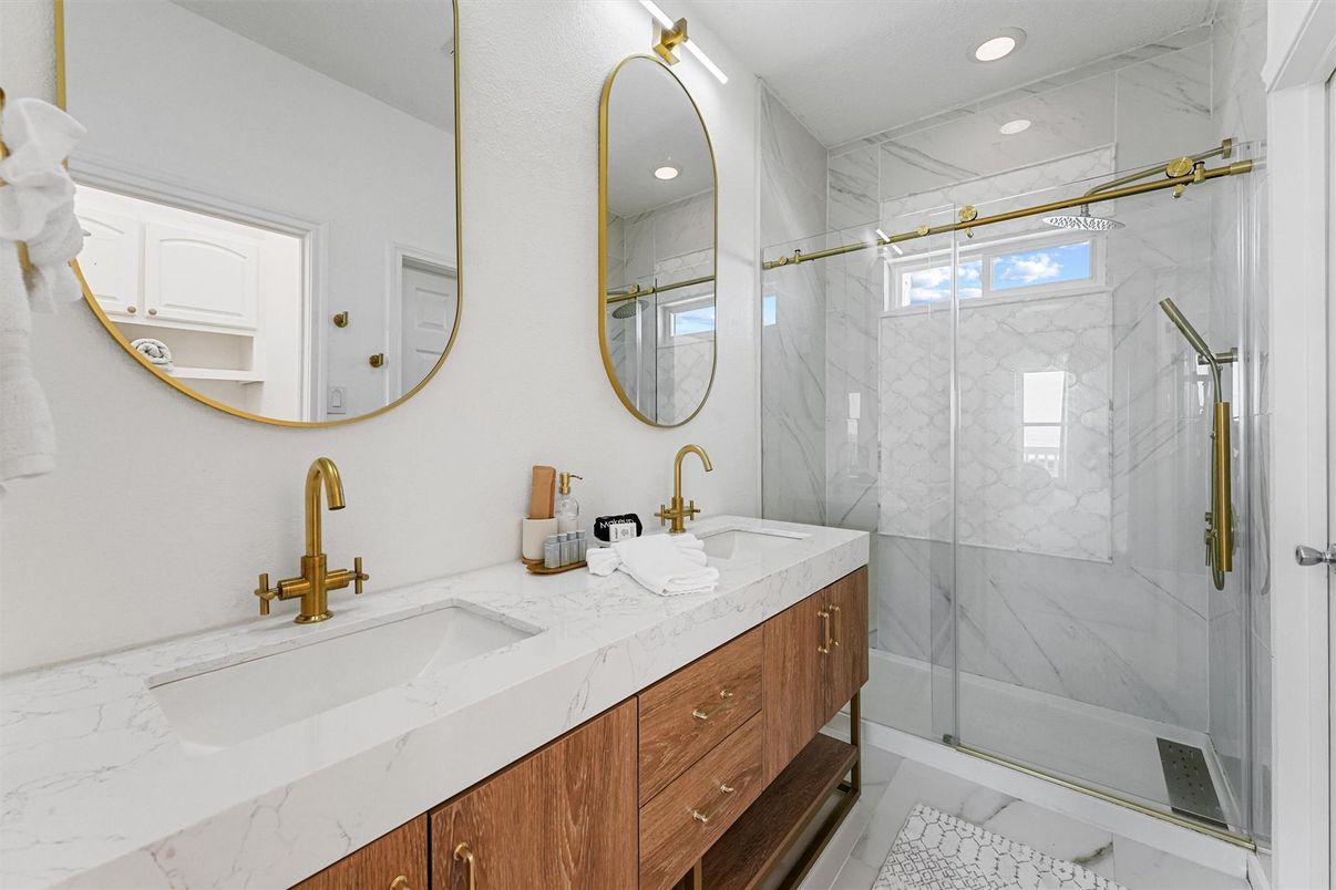 Bathroom, Dual Sink Vanities, Glass Shower, Interior, Marble, Marble Walls, Recessed Lighting