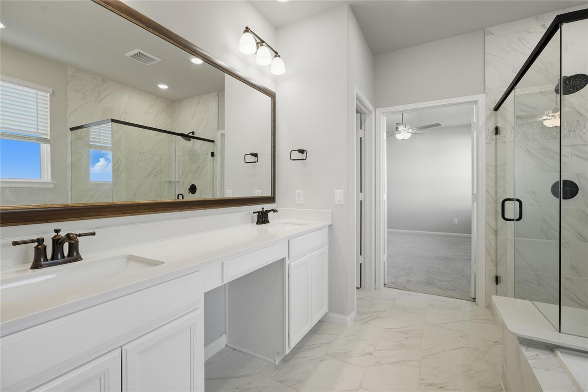 Bathroom, Dual Sink Vanities, Glass Shower, Interior, Marble, Marble Walls, Recessed Lighting