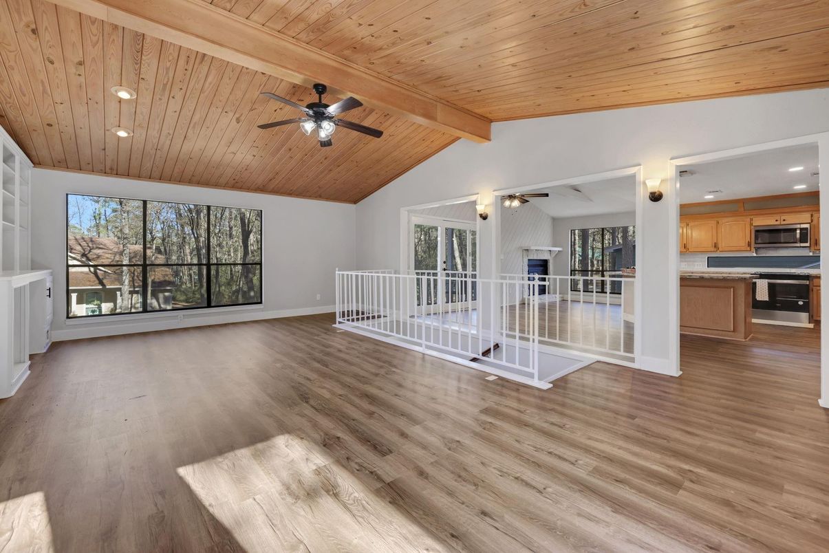 Empty room, Interior, Kitchen, Recessed Lighting, Stainless Steel Appliances, Wooden Beams, Wooden Ceilings, Wood Texture Flooring