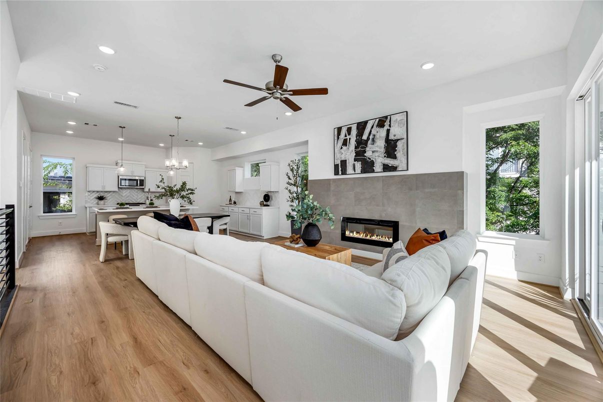 Dining room, Fireplace, Interior, Kitchen, Living room, Pendant Lights, Recessed Lighting, Wood Texture Flooring