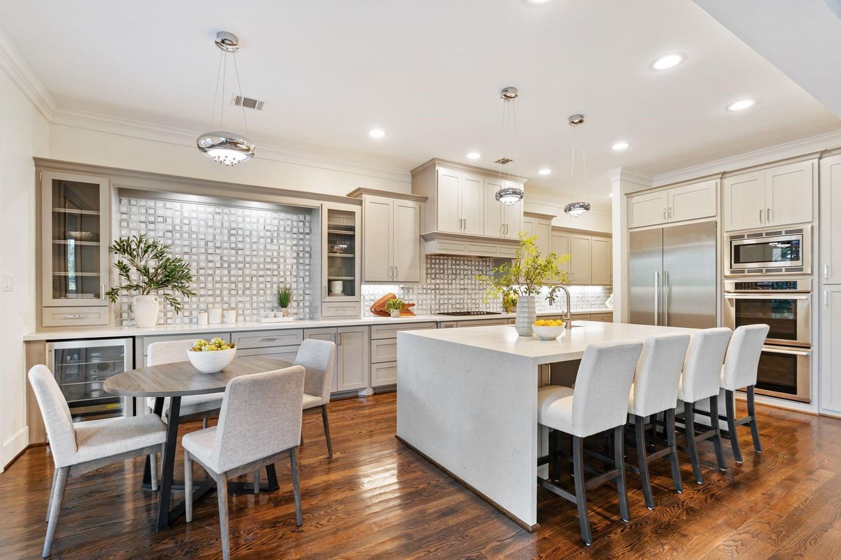 Dining room, Interior, Kitchen, Pendant Lights, Recessed Lighting, Stainless Steel Appliances, Wood Texture Flooring