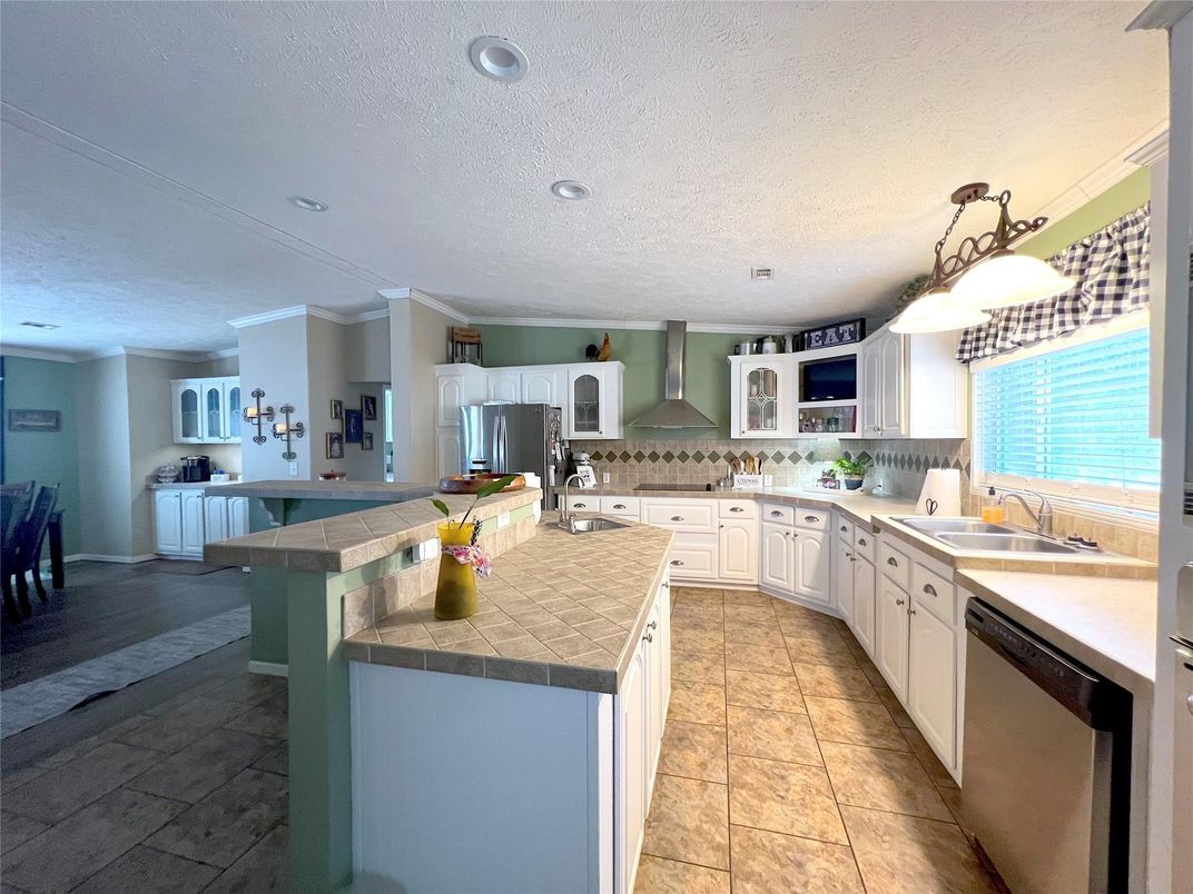 Interior, Kitchen, Recessed Lighting, Stainless Steel Appliances, Tile Countertops