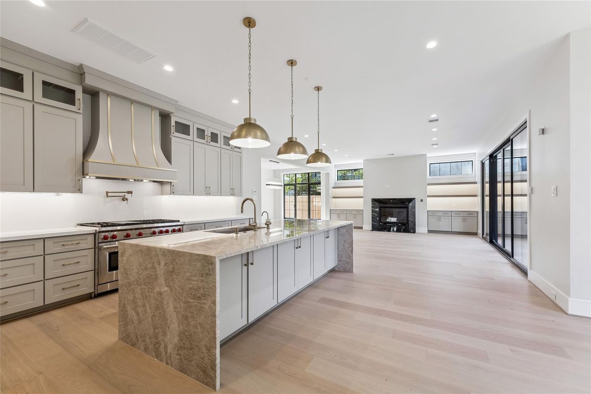 Fireplace, Interior, Kitchen, Pendant Lights, Recessed Lighting, Stainless Steel Appliances, Wood Texture Flooring