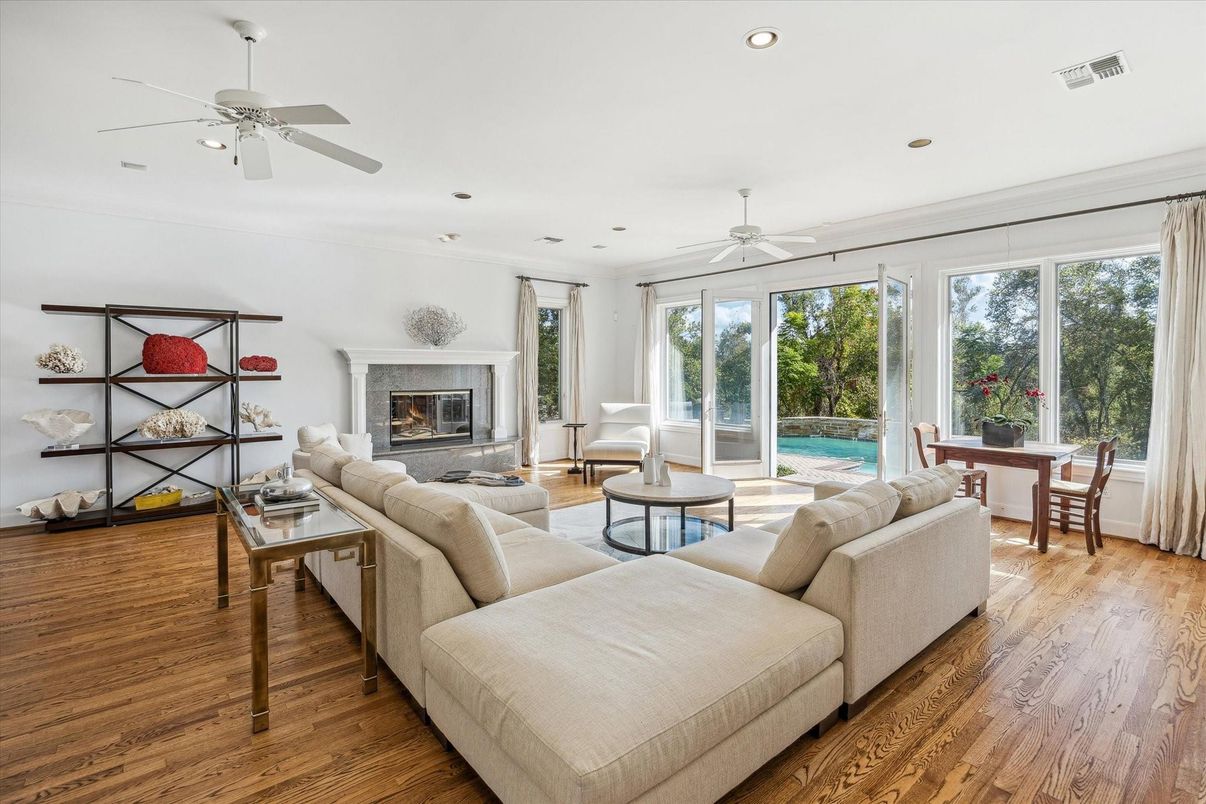 Dining room, Fireplace, Interior, Living room, Recessed Lighting, Wood Texture Flooring