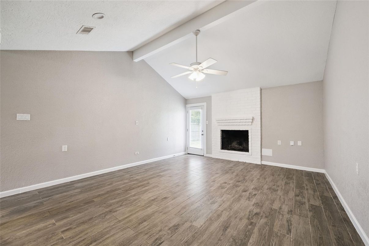 Empty room, Fireplace, Interior, Recessed Lighting, Wood Texture Flooring