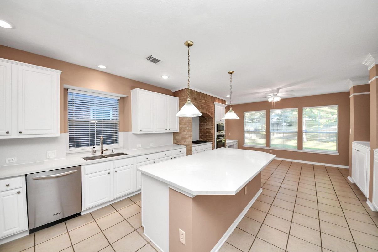 Interior, Kitchen, Pendant Lights, Recessed Lighting, Stainless Steel Appliances, Stone Walls