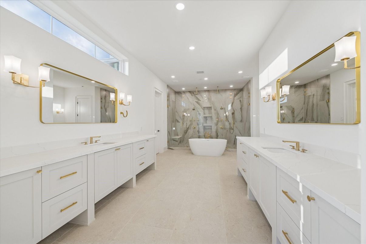 Bathroom, Dual Sink Vanities, Free Standing Baths, Glass Shower, Interior, Marble Walls, Recessed Lighting