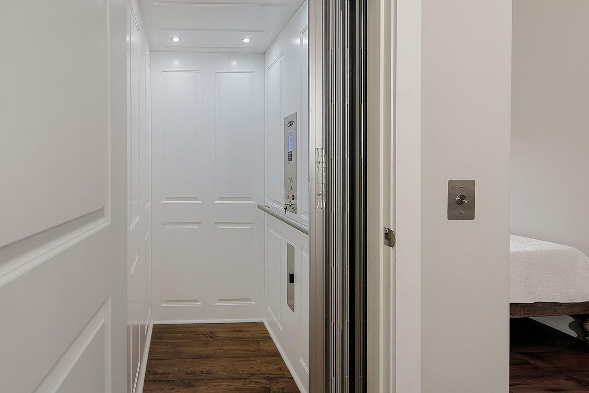 Elevator, Interior, Recessed Lighting, Wood Texture Flooring