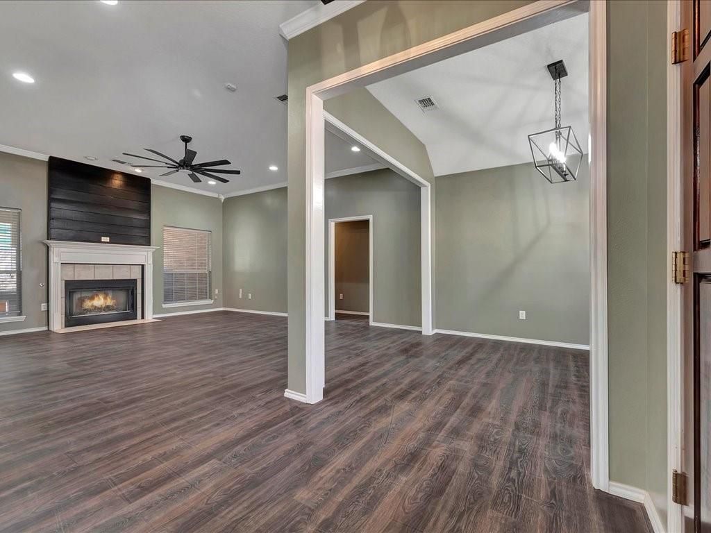 Empty room, Fireplace, Interior, Pendant Lights, Recessed Lighting, Wood Texture Flooring