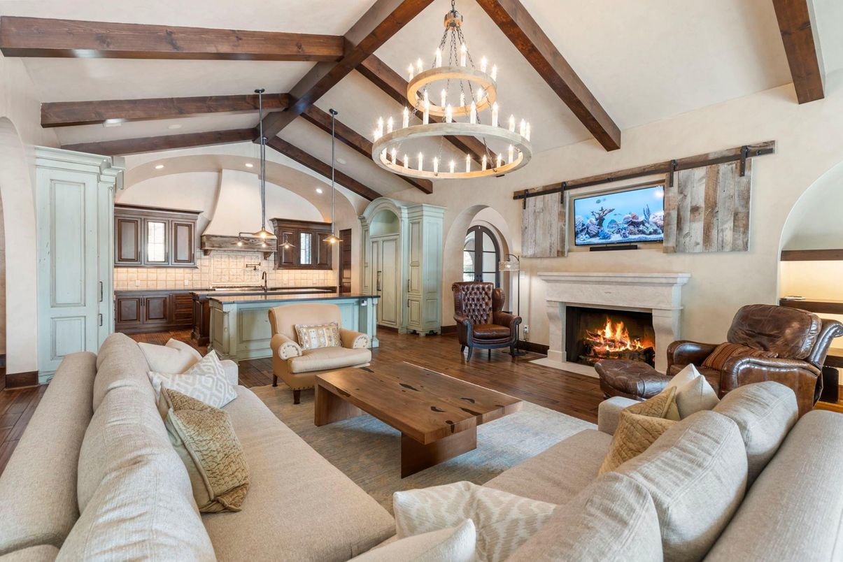 Chandelier, Fireplace, Interior, Kitchen, Living room, Pendant Lights, Recessed Lighting, Wooden Beams, Wood Texture Flooring