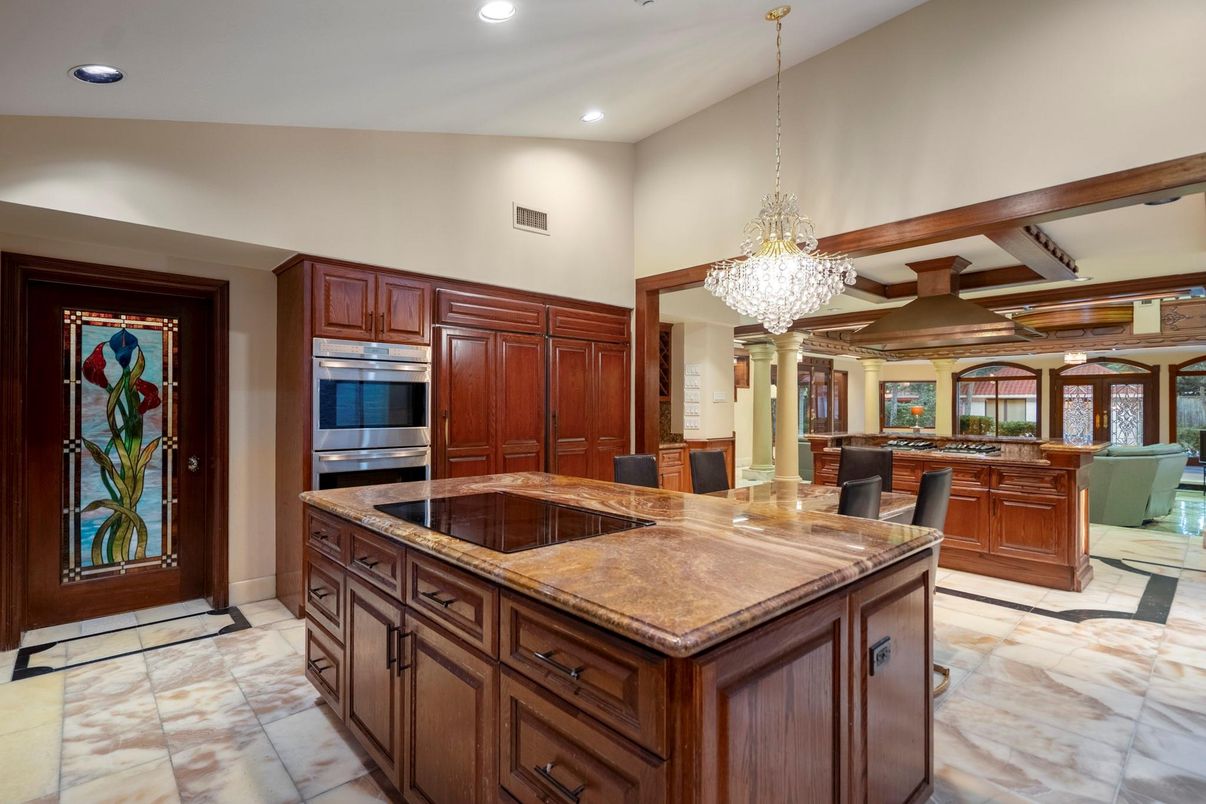 Chandelier, Dining room, Interior, Kitchen, Recessed Lighting, Stainless Steel Appliances, Wooden Beams