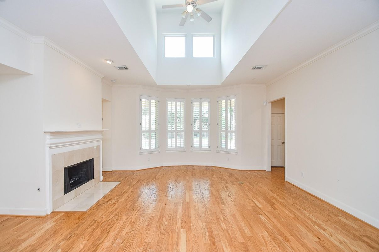 Empty room, Fireplace, Interior, Recessed Lighting, Wood Texture Flooring