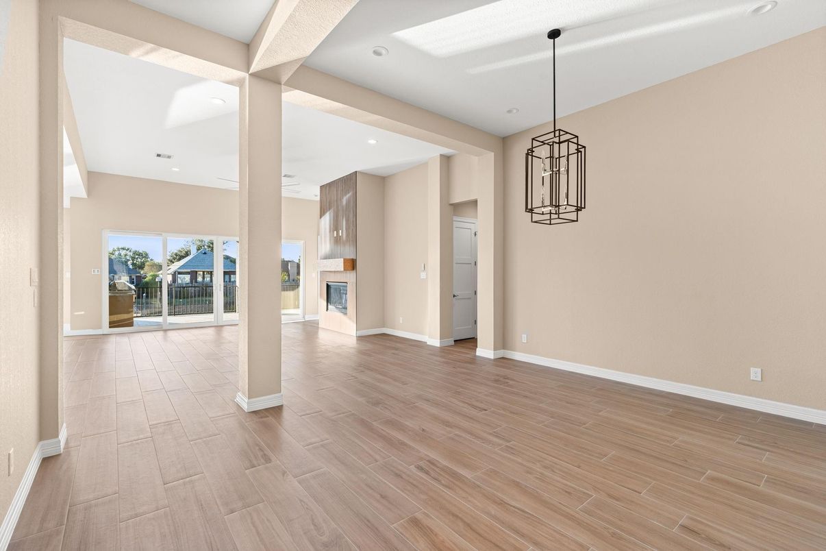 Empty room, Fireplace, Interior, Pendant Lights, Recessed Lighting, Wood Texture Flooring