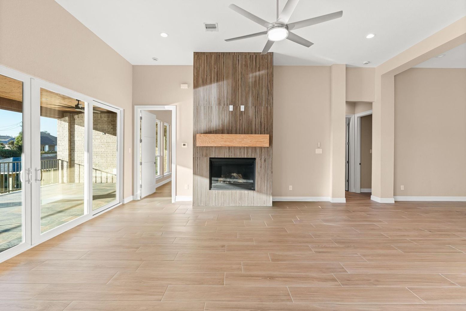 Empty room, Fireplace, Interior, Recessed Lighting, Wood Texture Flooring