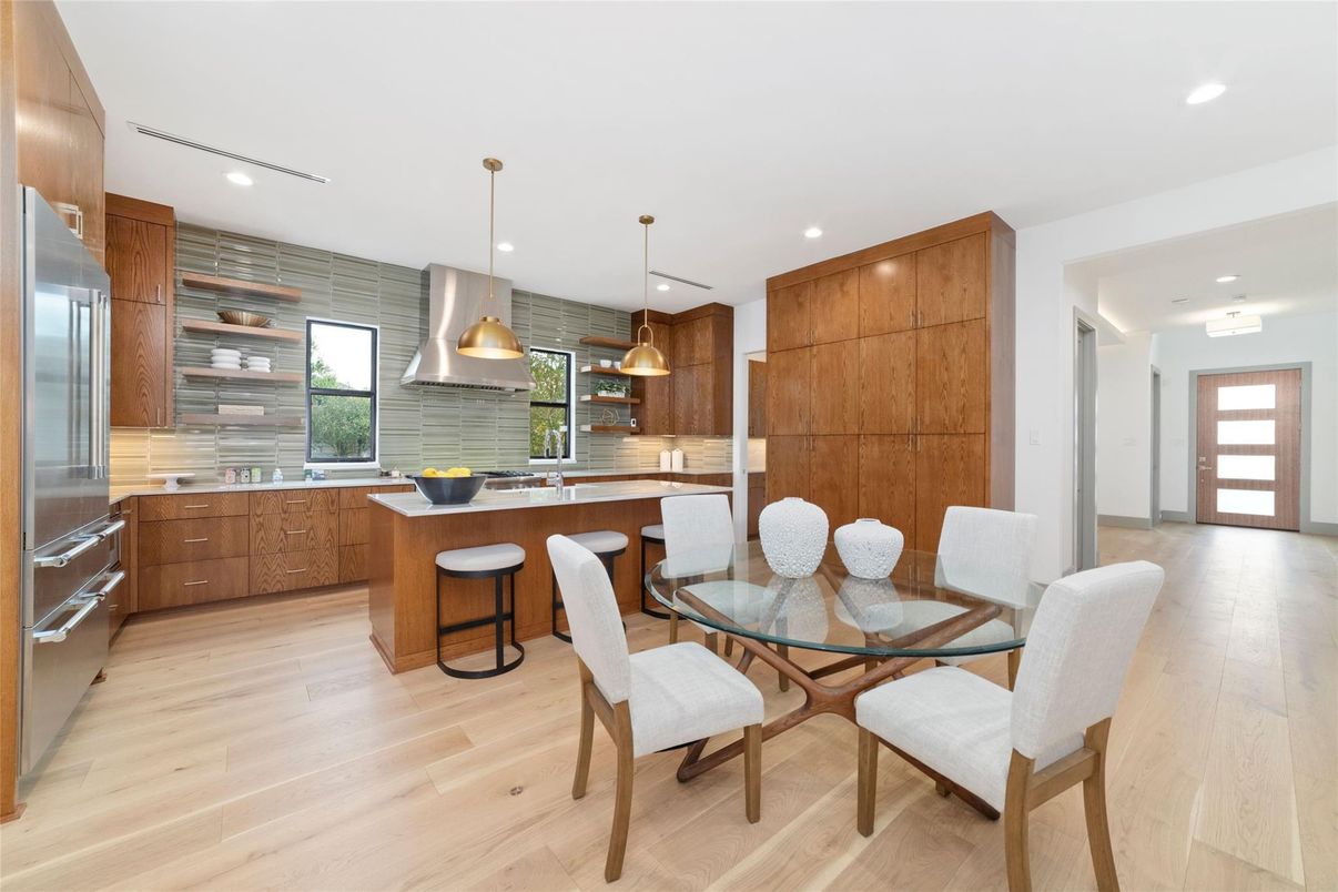 Dining room, Interior, Kitchen, Pendant Lights, Recessed Lighting, Stainless Steel Appliances, Wood Texture Flooring