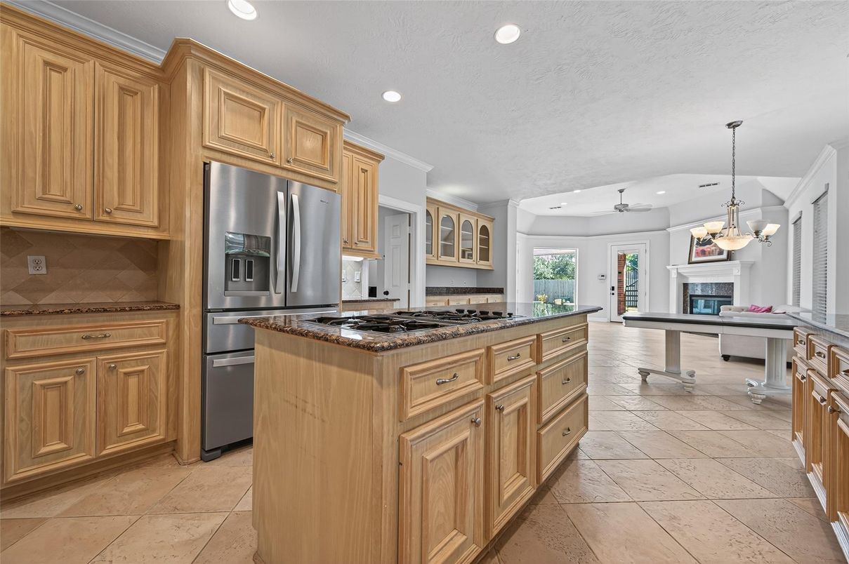 Chandelier, Dining room, Fireplace, Interior, Kitchen, Pendant Lights, Recessed Lighting, Stainless Steel Appliances
