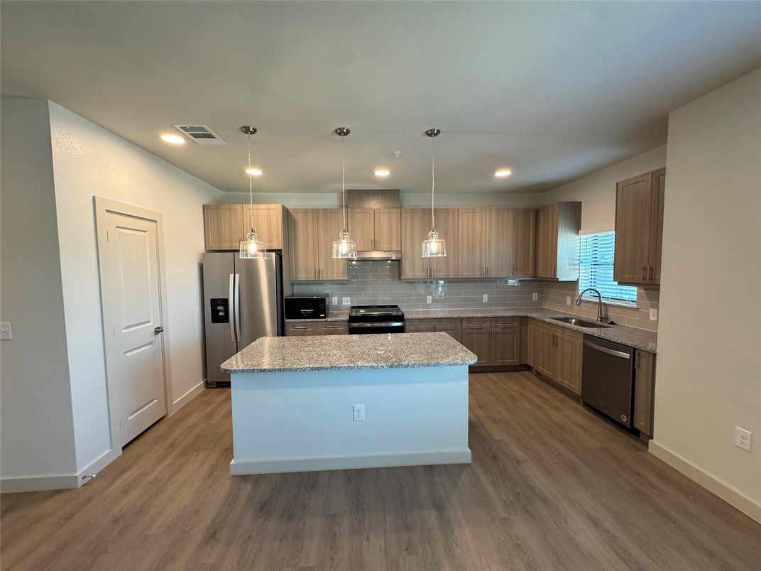 Interior, Kitchen, Pendant Lights, Recessed Lighting, Stainless Steel Appliances, Wood Texture Flooring