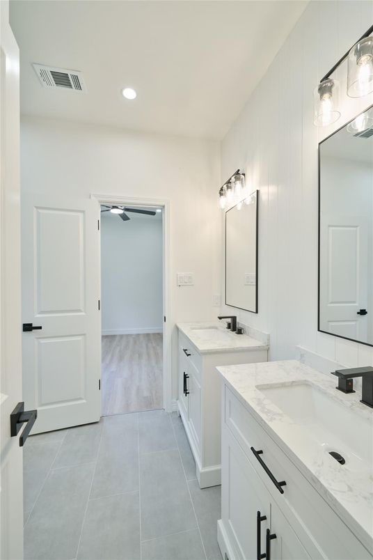 Bathroom, Dual Sink Vanities, Interior, Recessed Lighting, Wood Texture Flooring