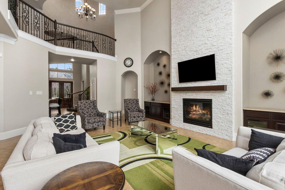 Chandelier, Fireplace, Interior, Living room, Recessed Lighting, Stone Walls