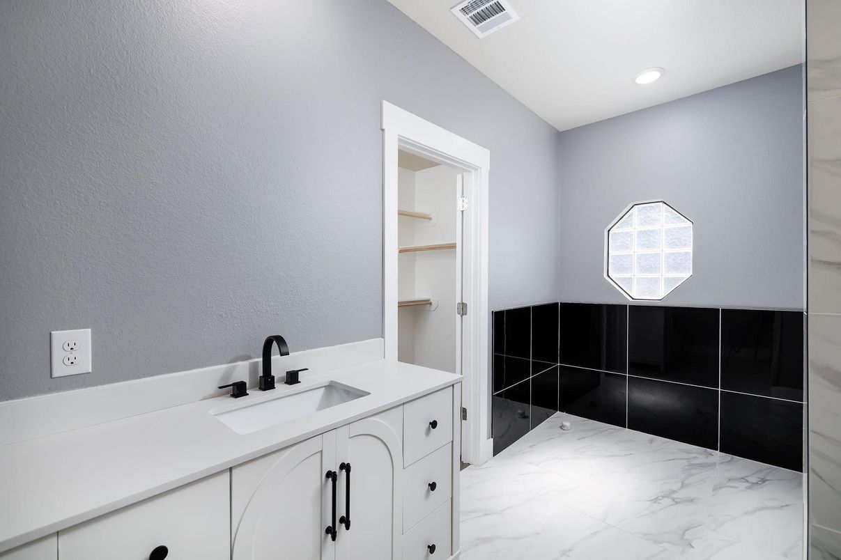 Bathroom, Dual Sink Vanities, Interior, Marble, Recessed Lighting