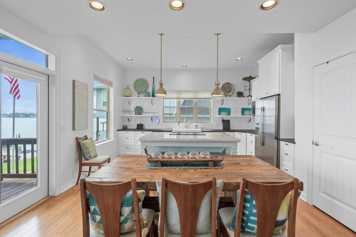 Dining room, Interior, Kitchen, Pendant Lights, Recessed Lighting, Stainless Steel Appliances, Wood Texture Flooring