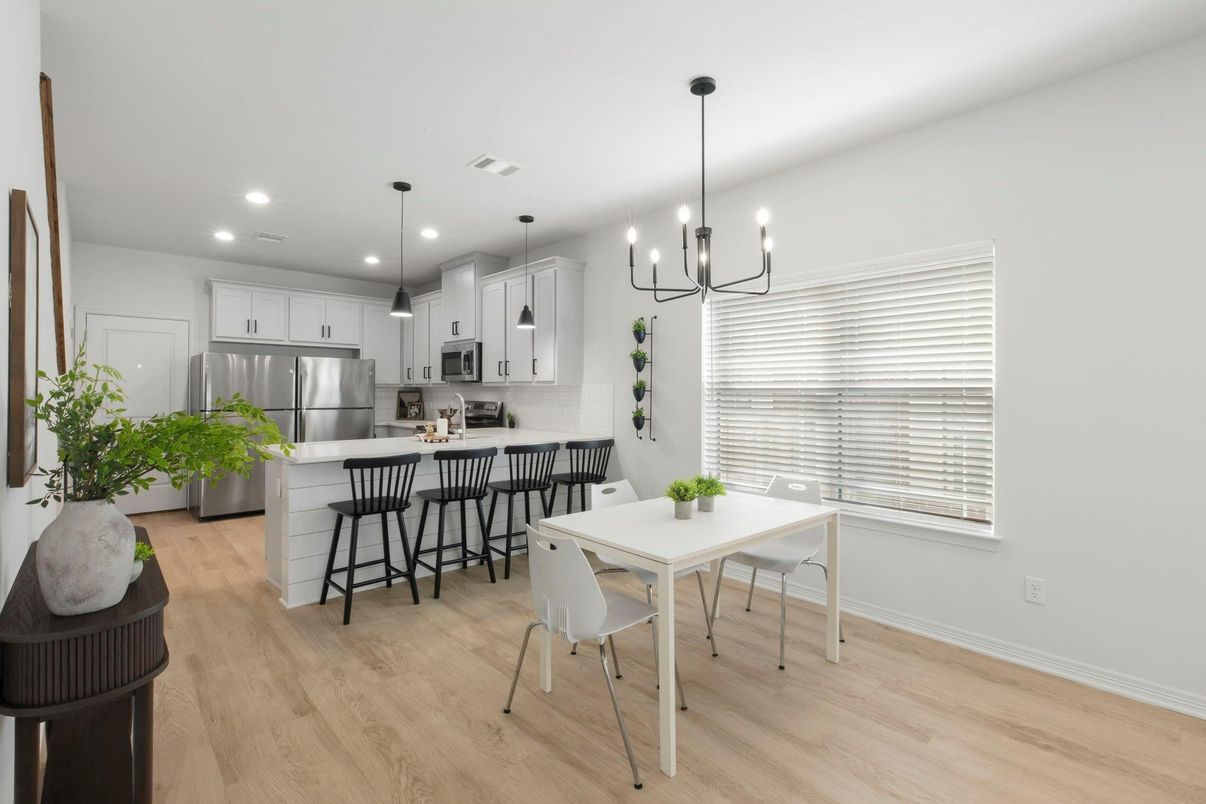 Dining room, Interior, Kitchen, Pendant Lights, Recessed Lighting, Stainless Steel Appliances, Wood Texture Flooring