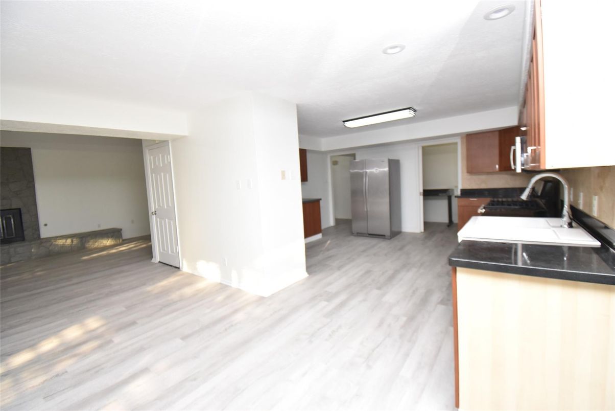 Fireplace, Interior, Kitchen, Recessed Lighting, Wood Texture Flooring