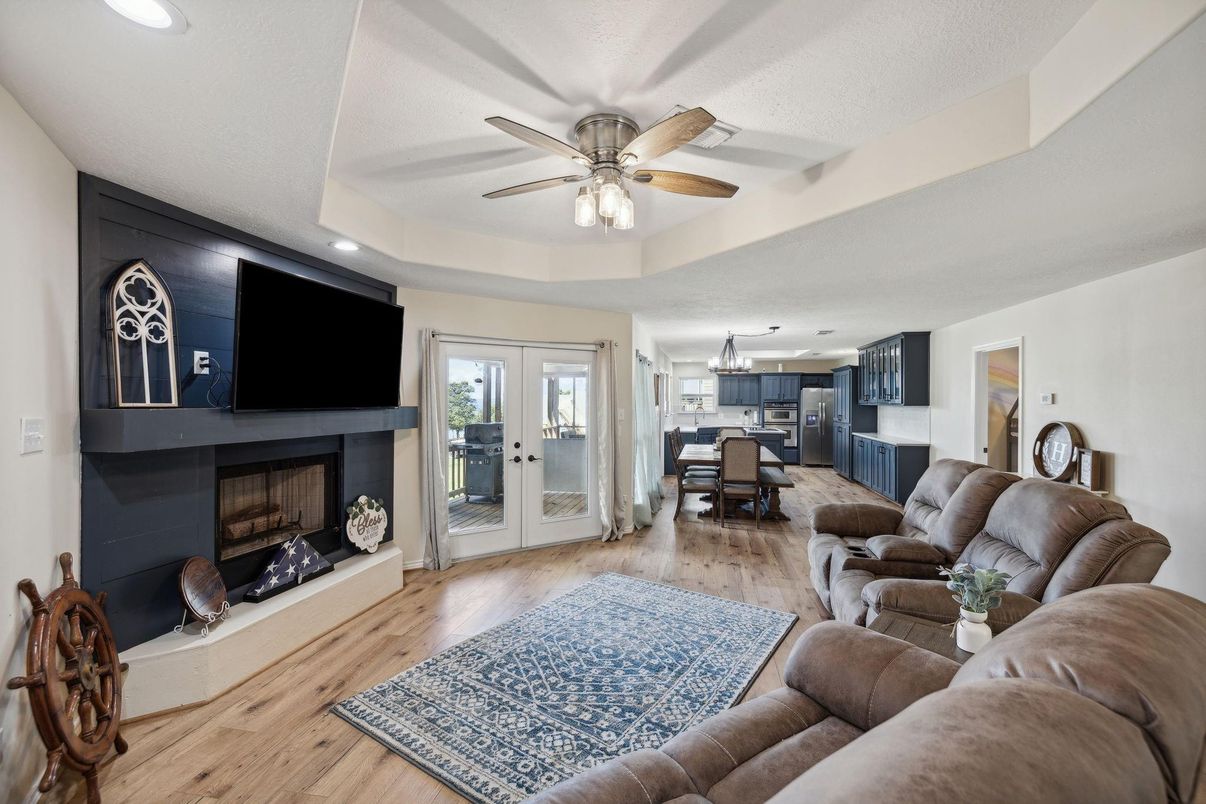 Dining room, Fireplace, Interior, Kitchen, Living room, Pendant Lights, Recessed Lighting, Wood Texture Flooring