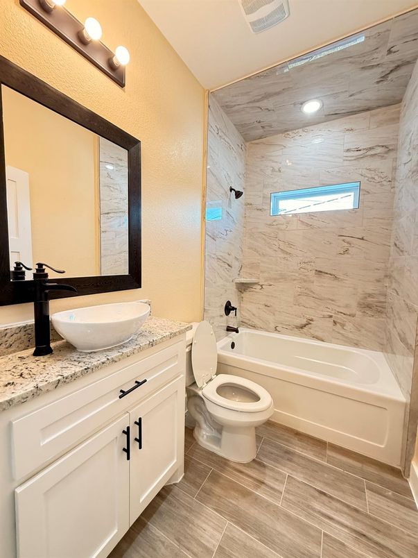 Bathroom, Dual Sink Vanities, Interior, Marble Walls, Recessed Lighting