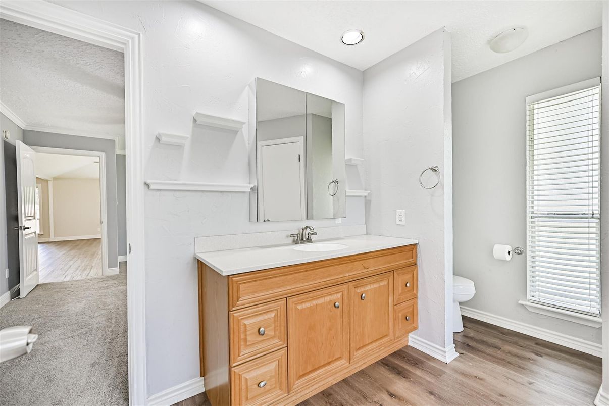 Bathroom, Dual Sink Vanities, Interior, Recessed Lighting, Wood Texture Flooring