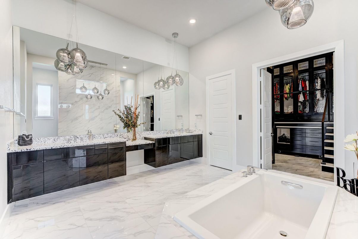 Bathroom, Dual Sink Vanities, Interior, Marble, Marble Walls, Pendant Lights, Recessed Lighting