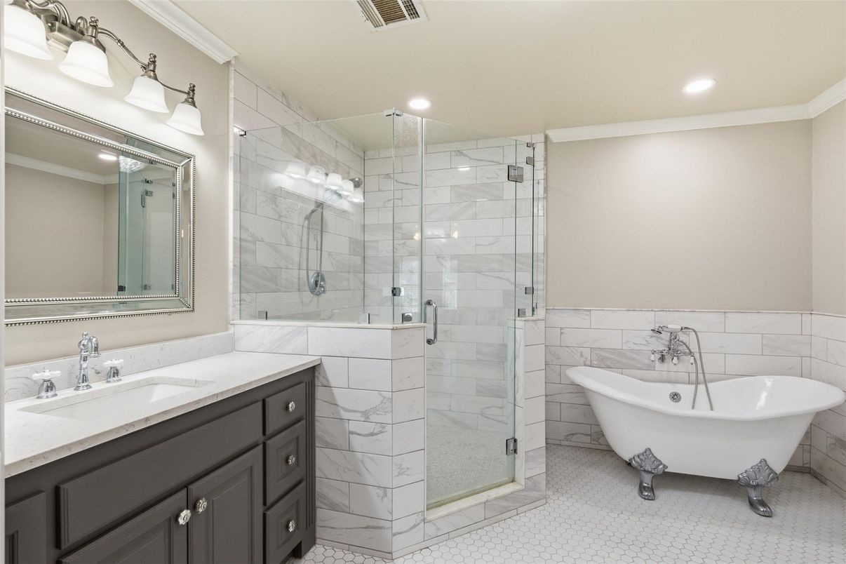 Bathroom, Dual Sink Vanities, Free Standing Baths, Glass Shower, Interior, Marble Walls, Recessed Lighting
