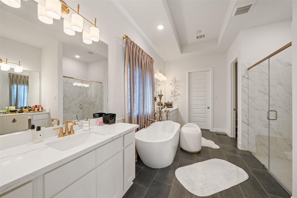 Bathroom, Dual Sink Vanities, Free Standing Baths, Glass Shower, Interior, Marble Walls, Recessed Lighting