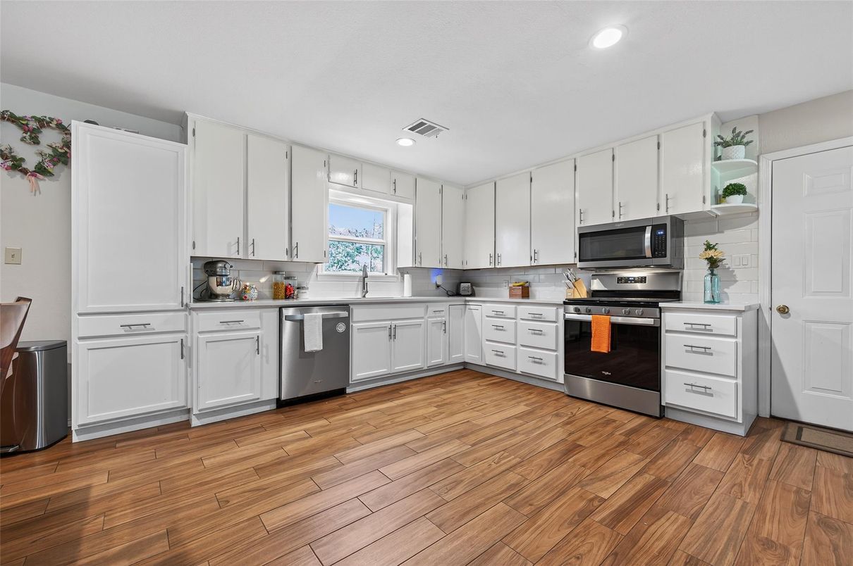 Interior, Kitchen, Recessed Lighting, Stainless Steel Appliances, Wood Texture Flooring