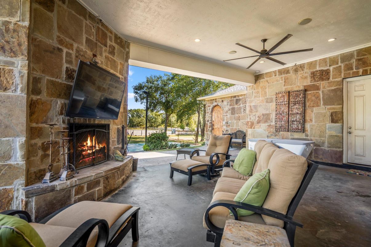 Exterior, Fireplace, Recessed Lighting, Stone Walls