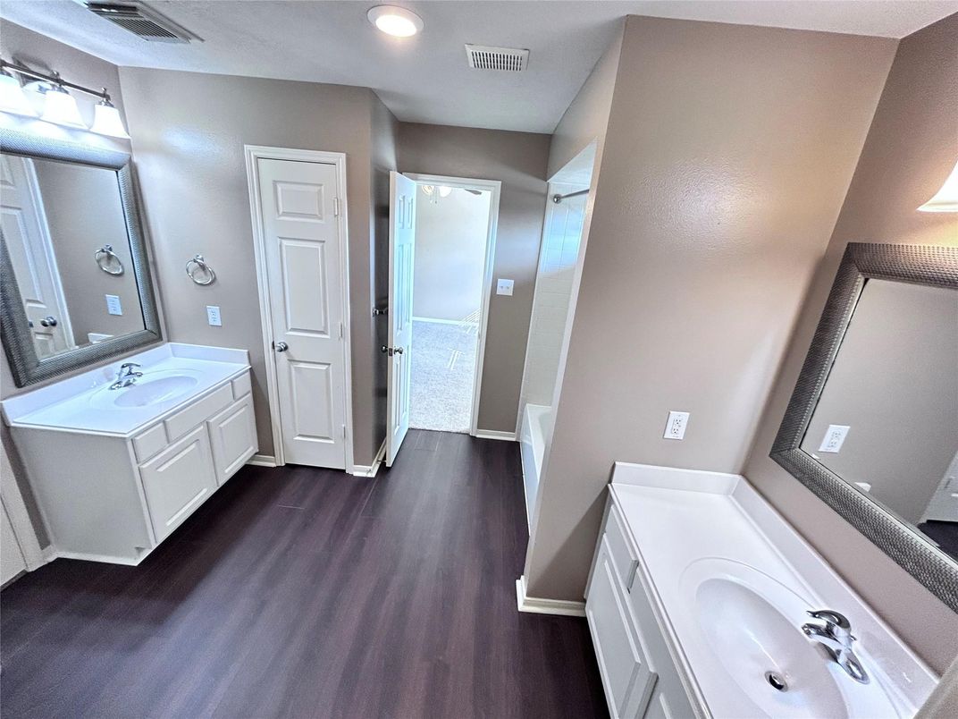 Bathroom, Dual Sink Vanities, Interior, Recessed Lighting, Wood Texture Flooring