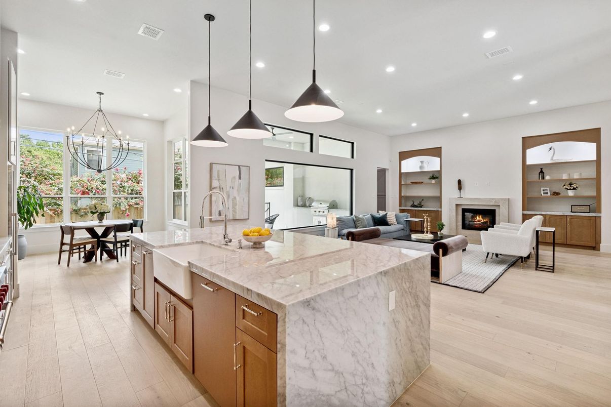 Chandelier, Dining room, Fireplace, Interior, Kitchen, Living room, Pendant Lights, Recessed Lighting, Wood Texture Flooring