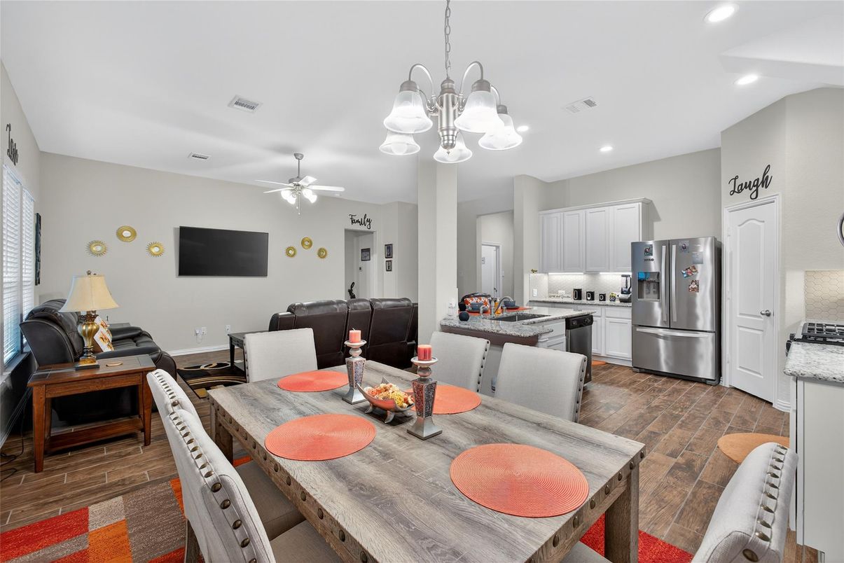 Chandelier, Dining room, Interior, Kitchen, Living room, Recessed Lighting, Stainless Steel Appliances, Wood Texture Flooring