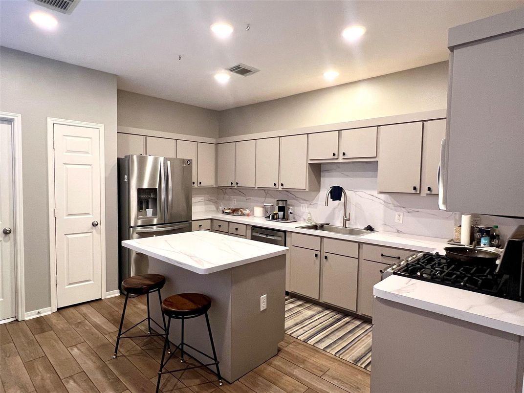 Interior, Kitchen, Recessed Lighting, Stainless Steel Appliances, Wood Texture Flooring
