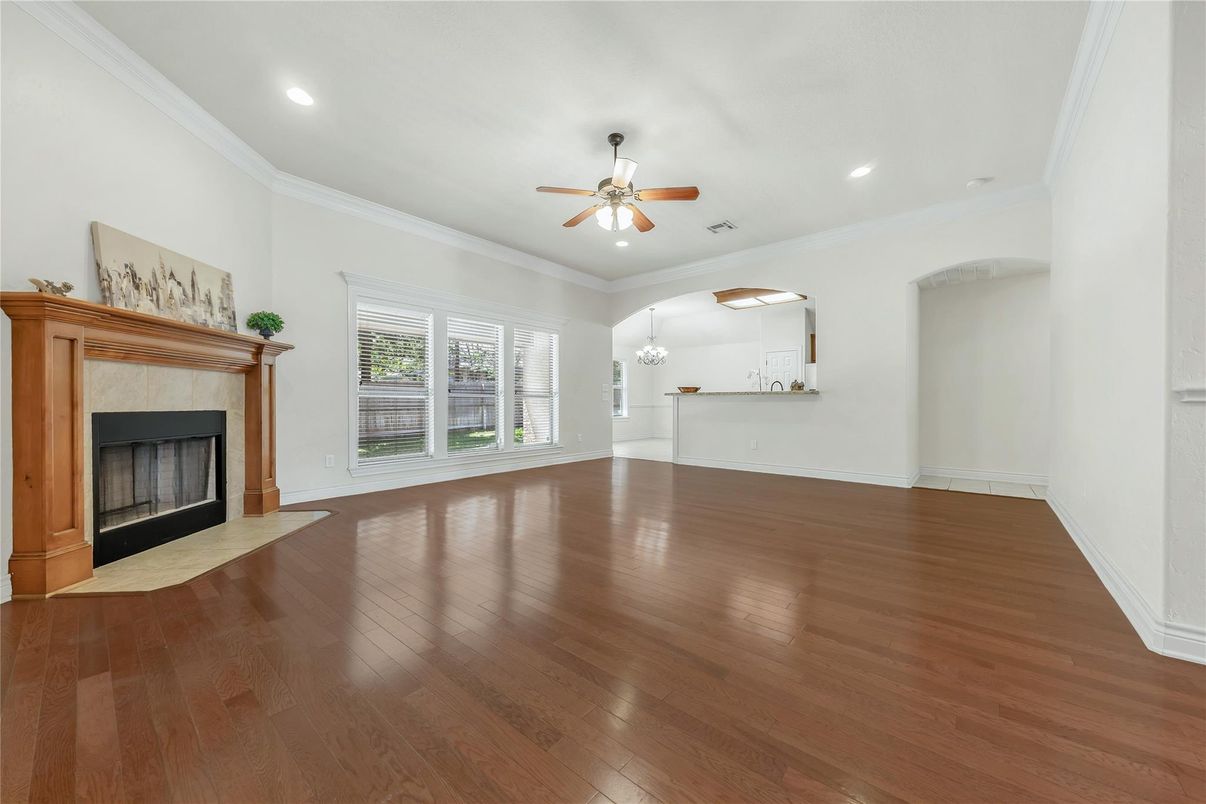 Empty room, Fireplace, Interior, Recessed Lighting, Wood Texture Flooring