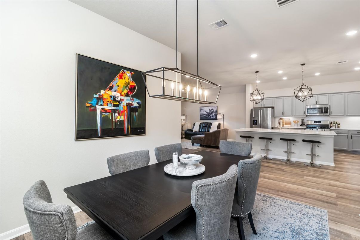 Dining room, Interior, Kitchen, Pendant Lights, Recessed Lighting, Stainless Steel Appliances, Wood Texture Flooring